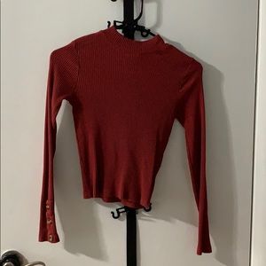 Robbed rust colored crop top with button sleeves